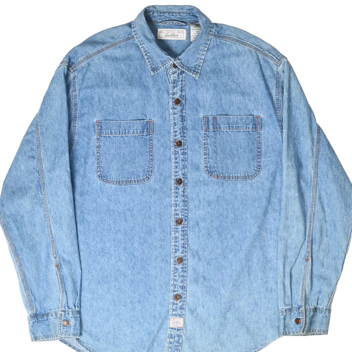 Front of Levi Strauss Signature blue denim button-up shirt with two chest pockets