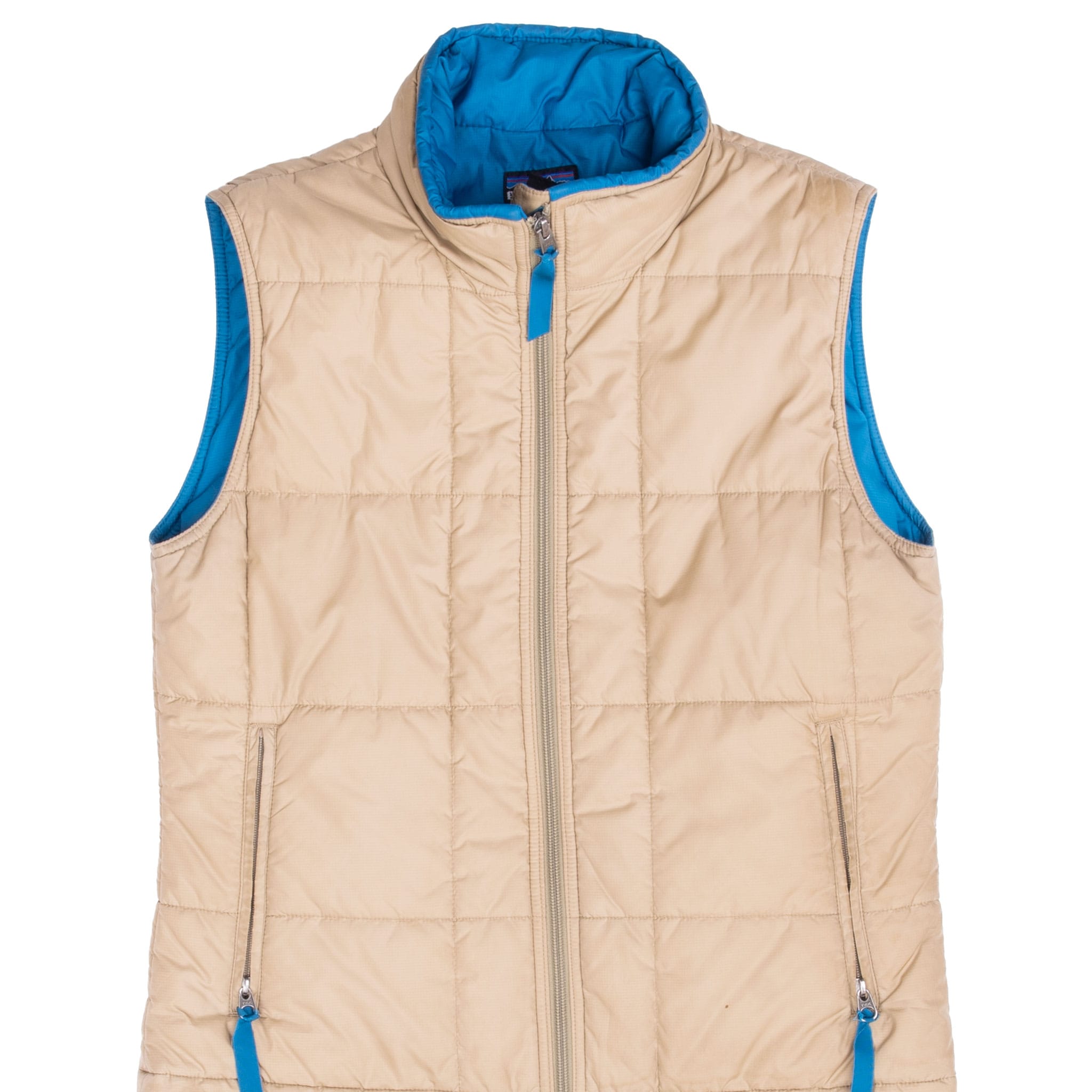 Upper front of beige Patagonia women's puffer vest with blue trim and zippered pockets