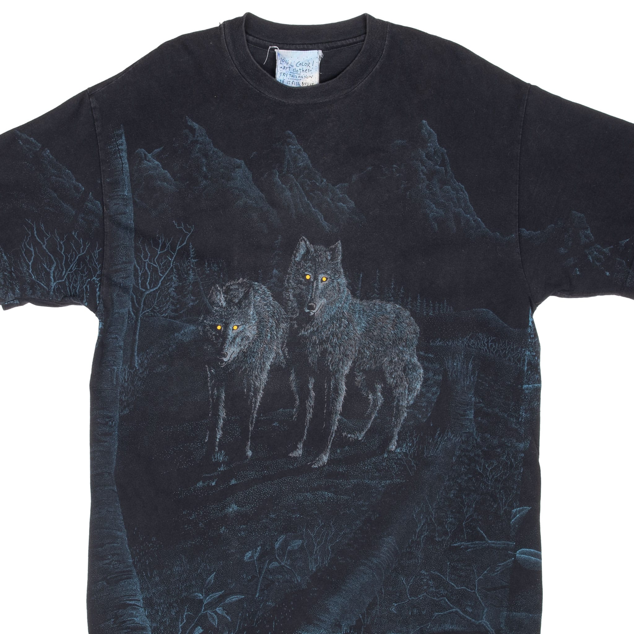 Front detail of dark Local Color Art T-shirt with two wolves in a blue-toned forest scene
