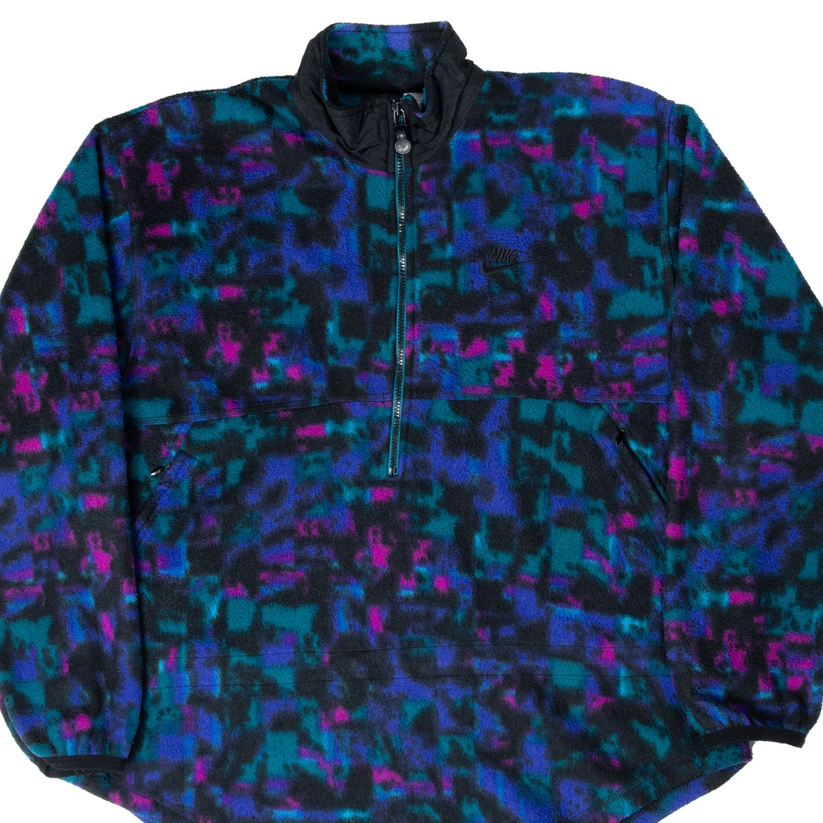 Front of Nike F.I.T. quarter-zip fleece jacket with teal, blue, magenta and black abstract pattern