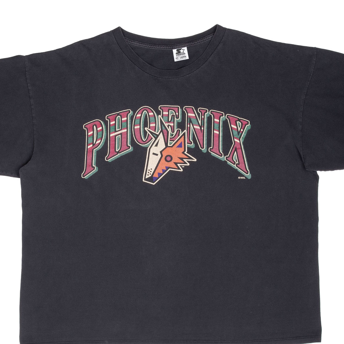 Front of black Starter Phoenix Coyotes T-shirt with arched Phoenix wordmark and team logo