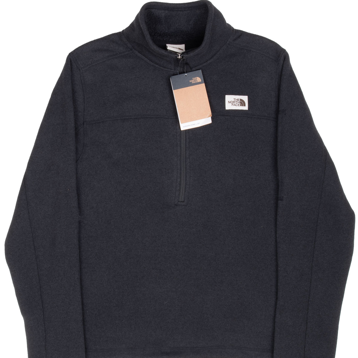 Front of The North Face black Gordon Lyons quarter-zip jacket with logo patch and hangtag