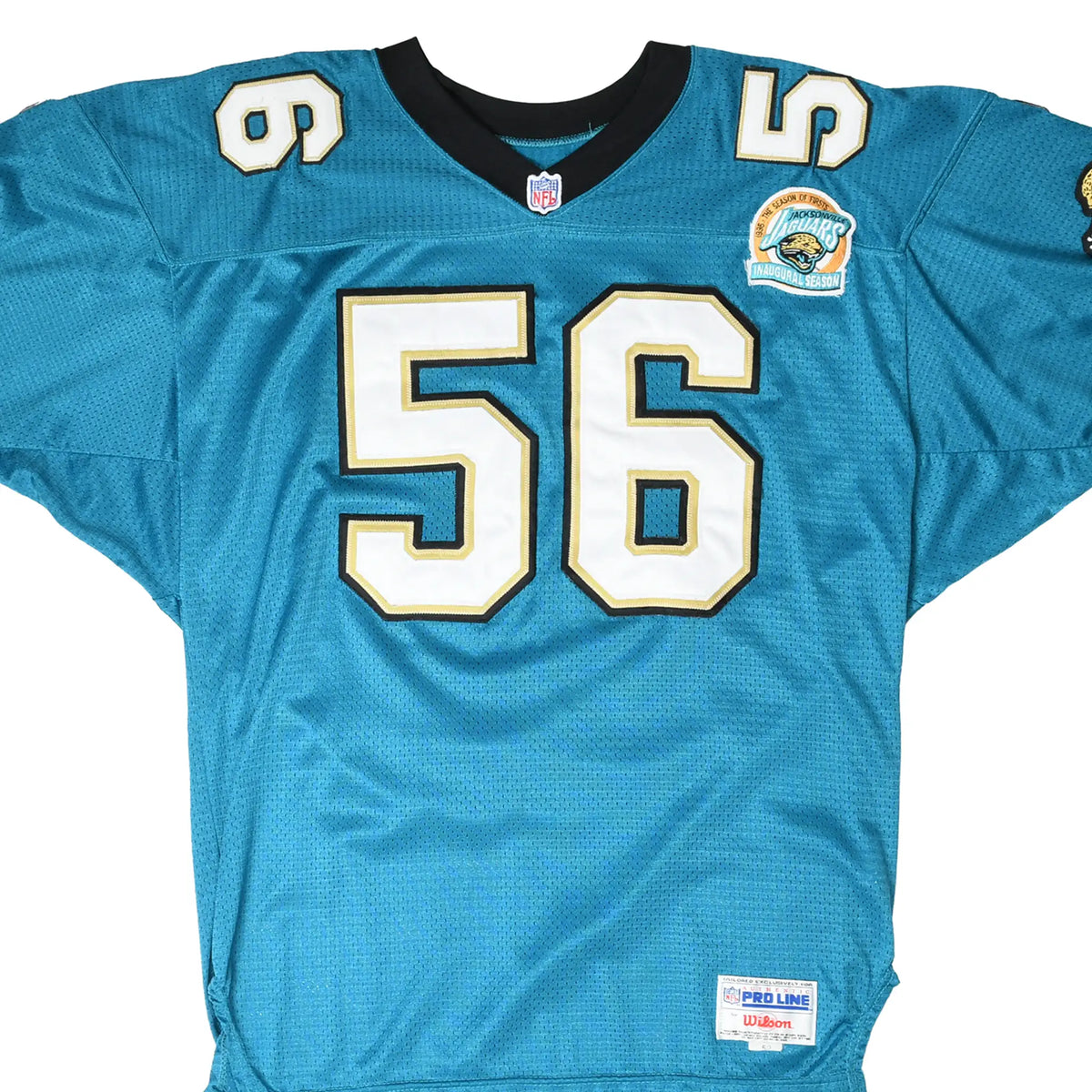 Front close-up of teal Jacksonville Jaguars Wilson jersey with white number 56 and inaugural season patch