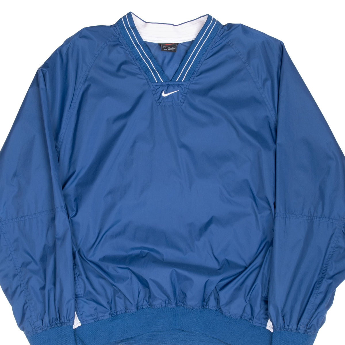 Front of blue Nike pullover windbreaker with white center Swoosh and striped V-neck collar