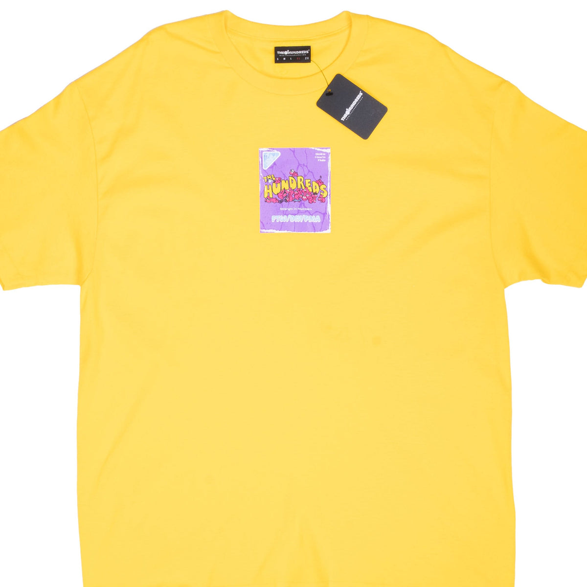 Front of yellow The Hundreds T-shirt with purple bunny chest graphic and attached hangtag