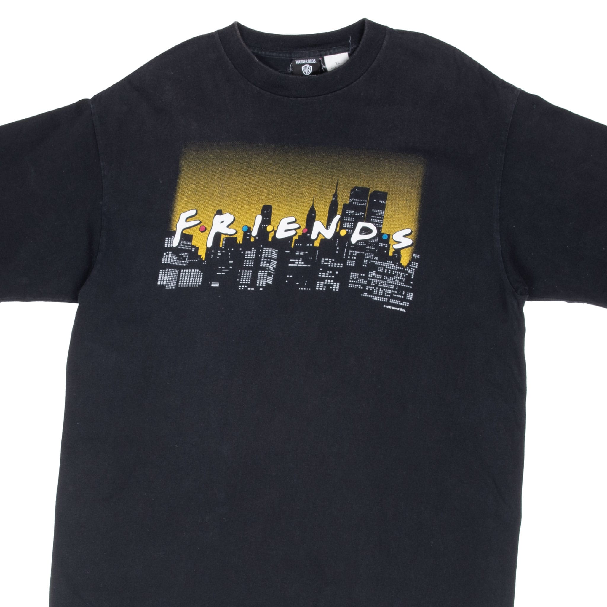 Close front view of black Friends TV show T-shirt with logo and city skyline graphic