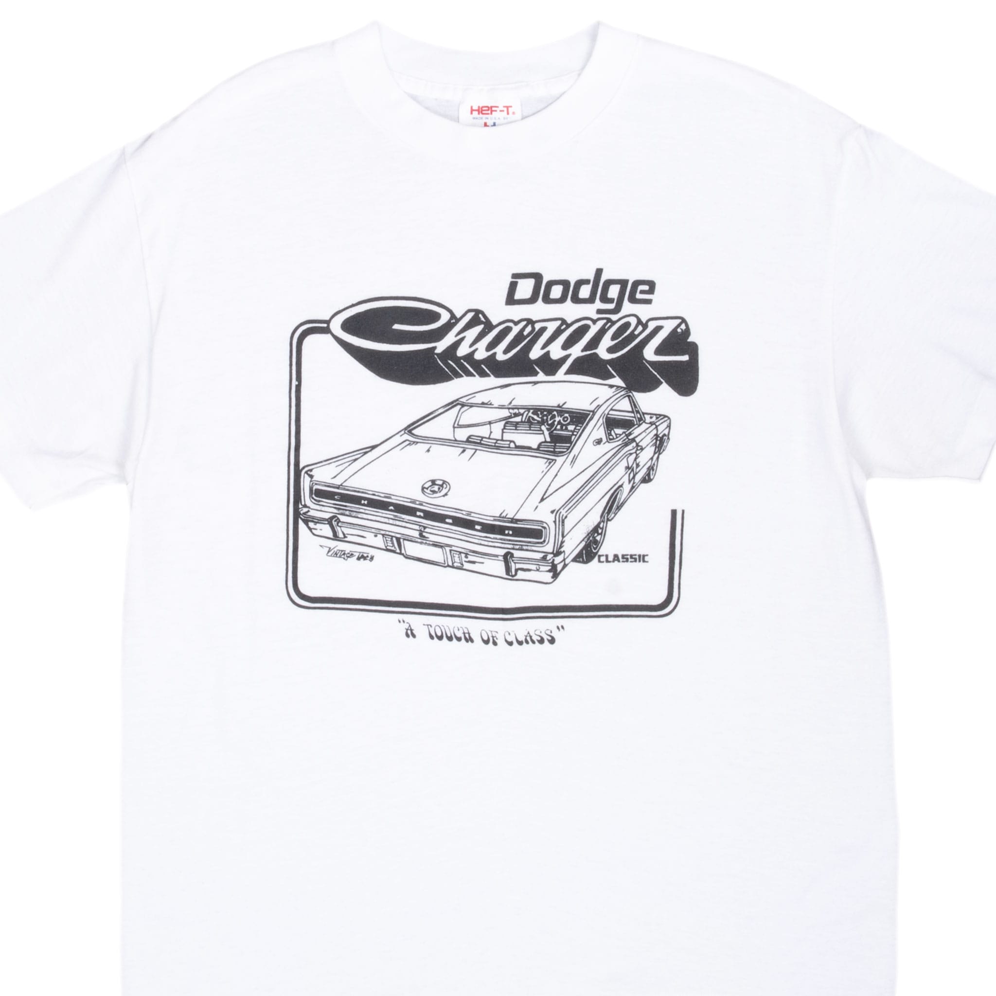 Front of white Dodge Charger T-shirt with black car graphic and A Touch of Class slogan