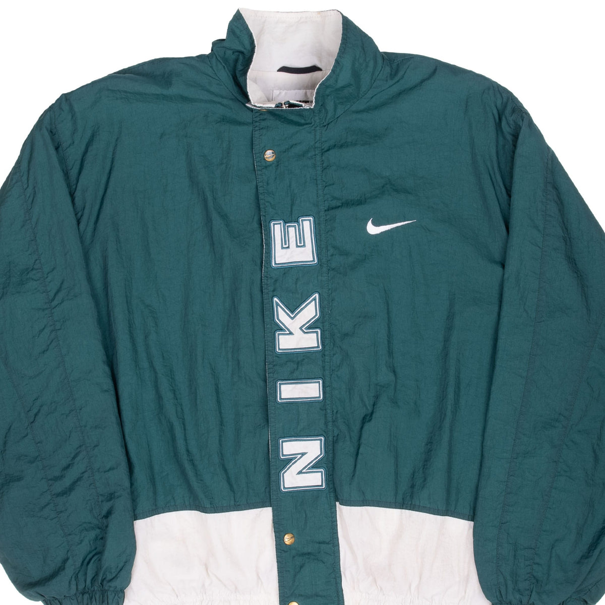 Front upper detail of green Nike windbreaker with white Swoosh and vertical spellout placket