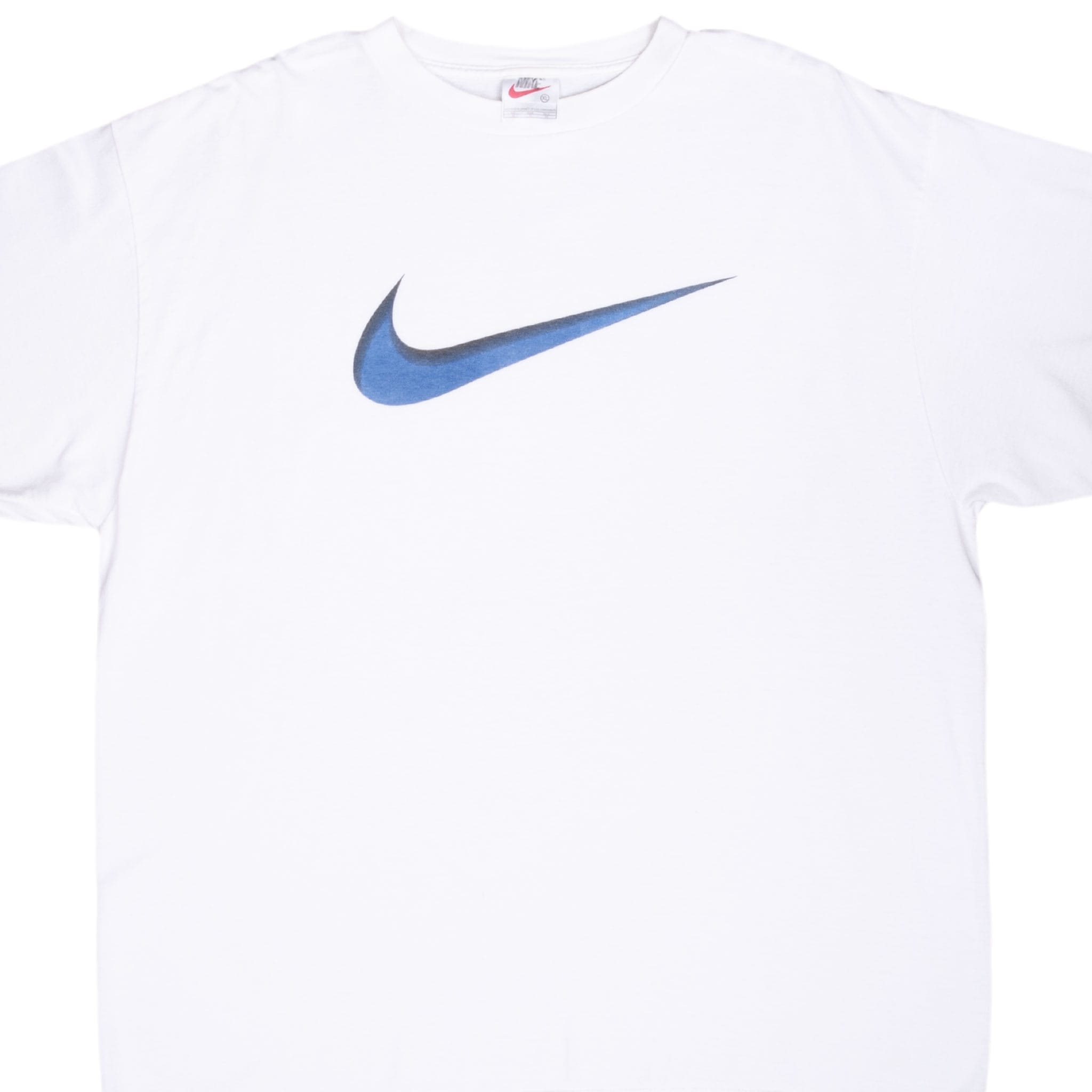 Front upper view of white Nike T-shirt with oversized blue and black Swoosh graphic