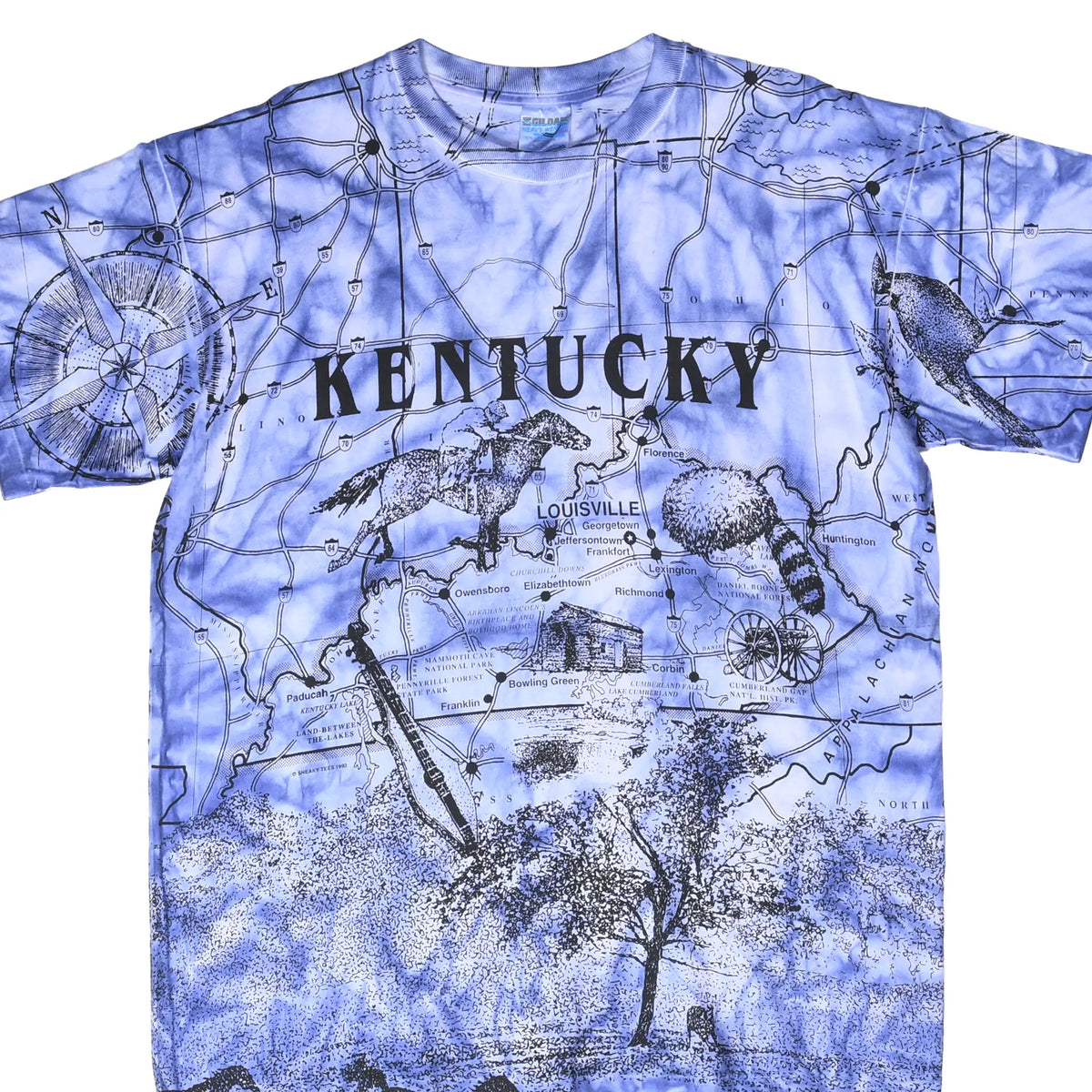 Close-up of blue tie-dye Kentucky T-shirt front with map, wildlife, compass and landscape print