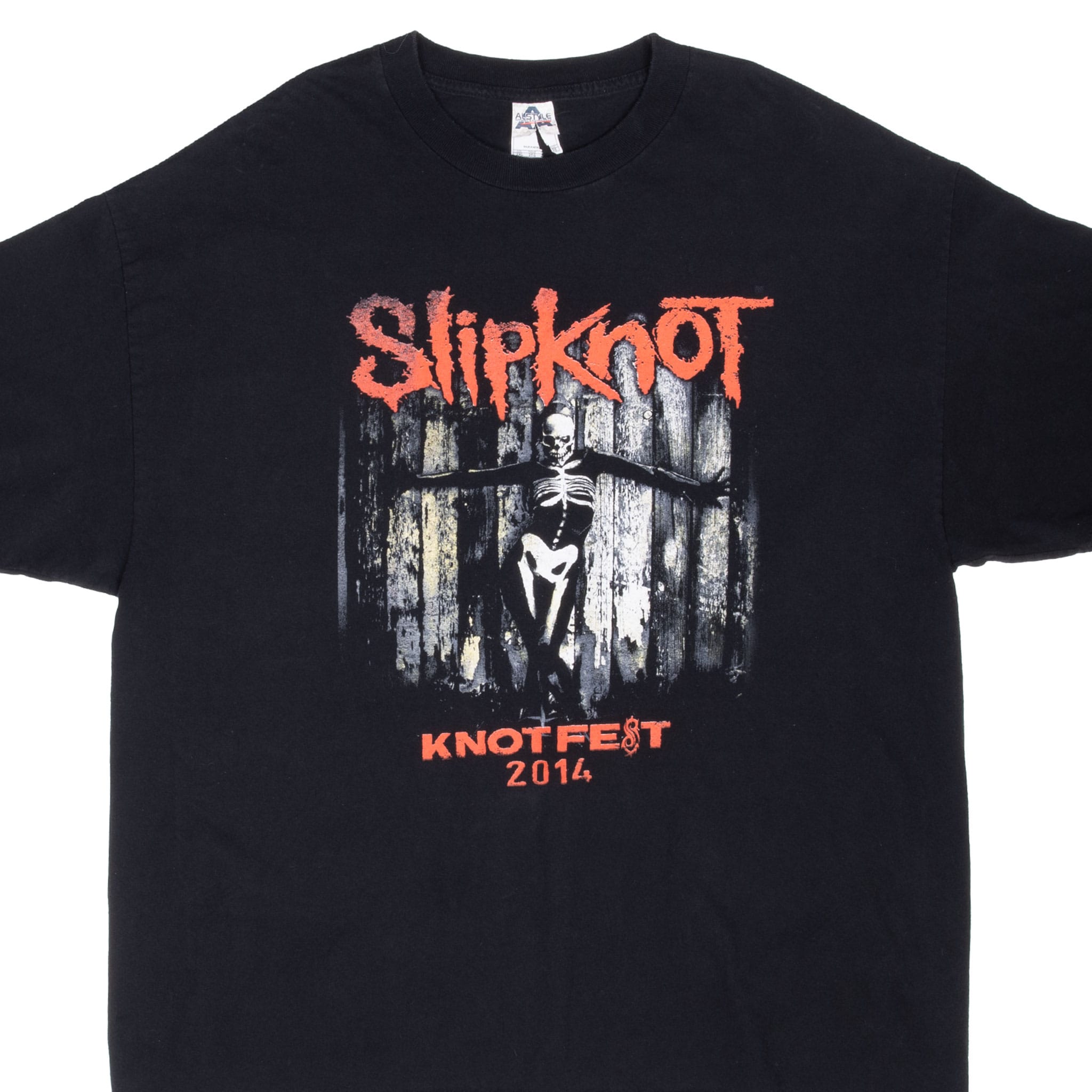 Close-up of black Slipknot T-shirt front with skeleton graphic and red Knotfest 2014 lettering
