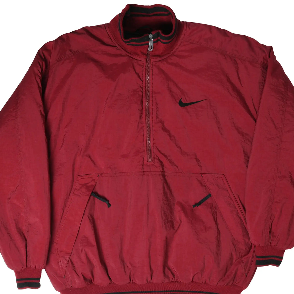 Front of burgundy Nike pullover jacket with black Swoosh, half zip, and kangaroo pocket