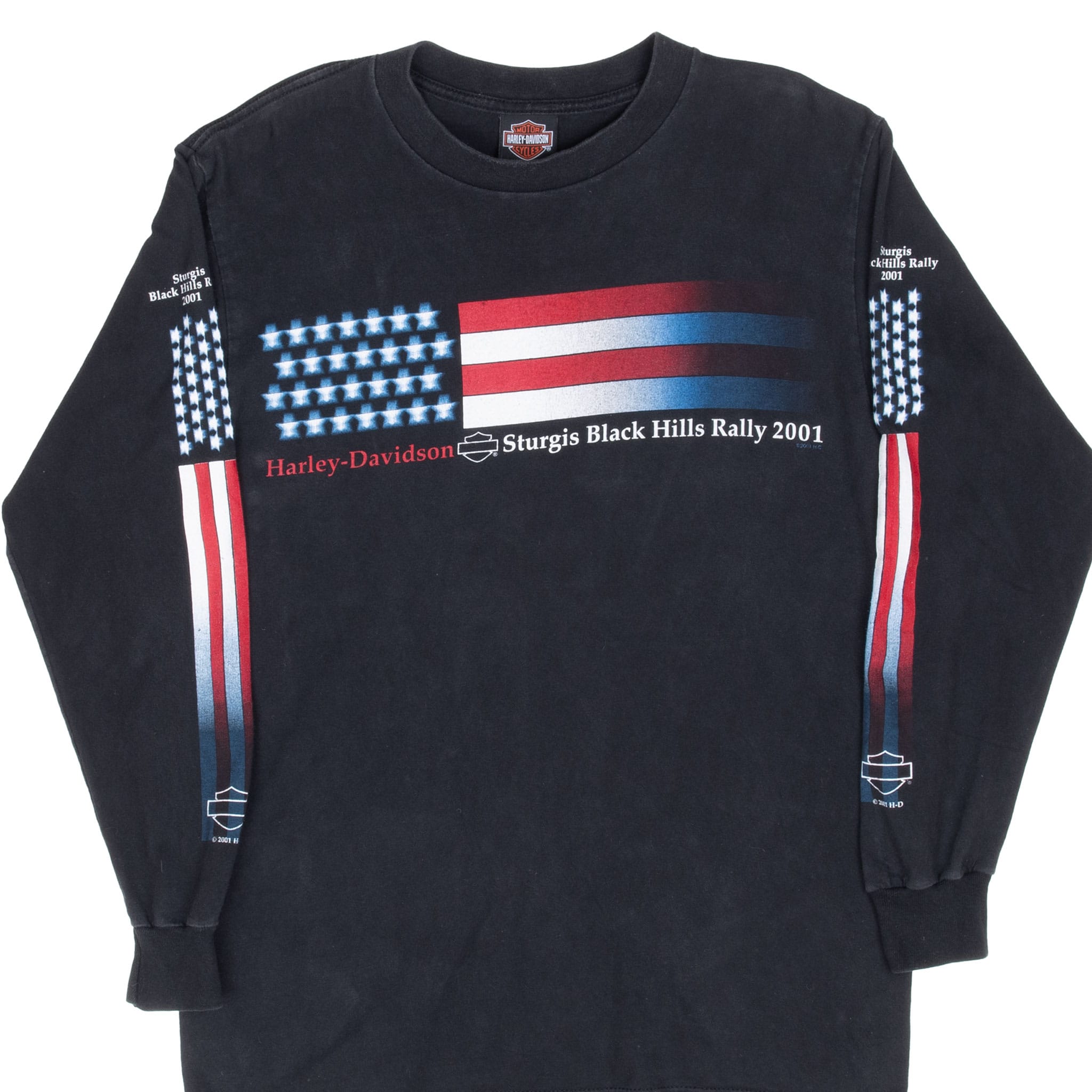 Front of black Harley-Davidson Sturgis 2001 long-sleeve tee with flag graphics