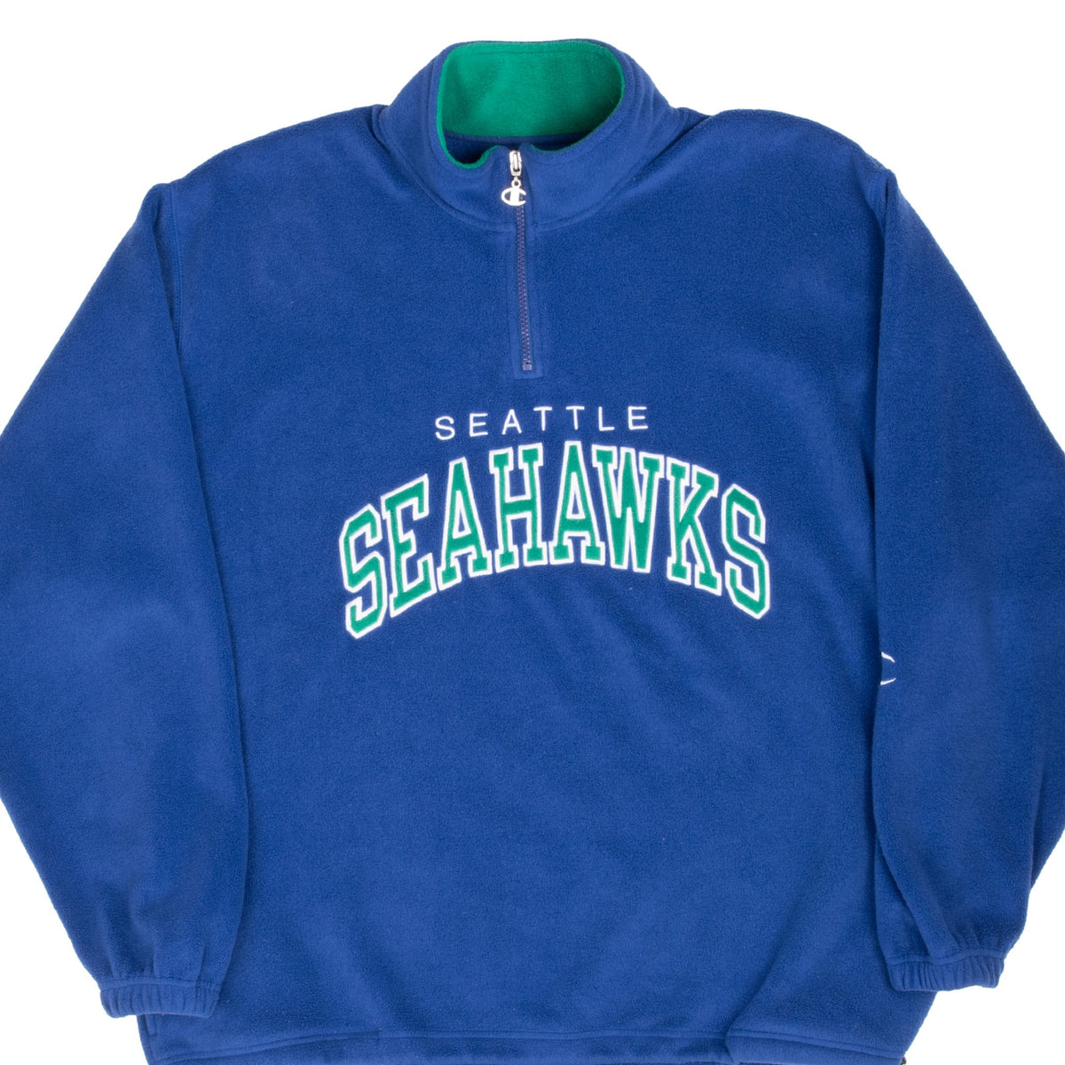 Front of blue Champion Seattle Seahawks quarter-zip fleece with green and white chest lettering