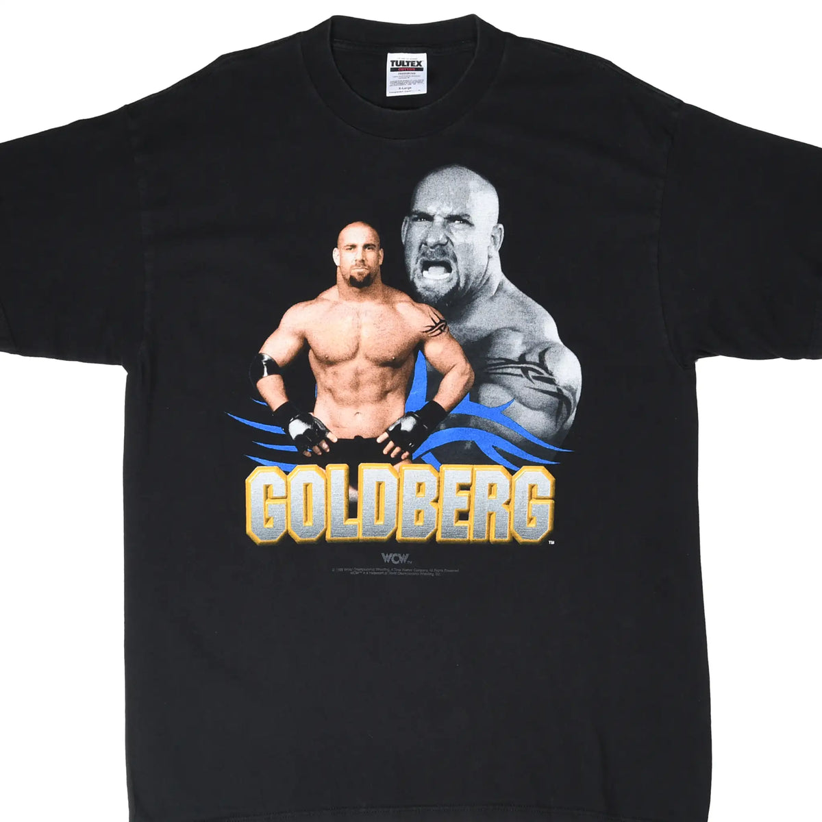 Front of black WCW T-shirt with Goldberg portraits and gold, gray, and blue name graphic