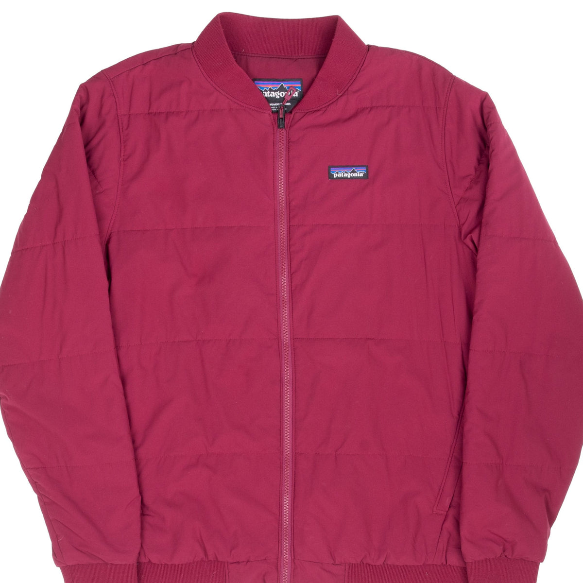 Front detail of burgundy Patagonia Zemer women's bomber jacket with zipper and chest logo