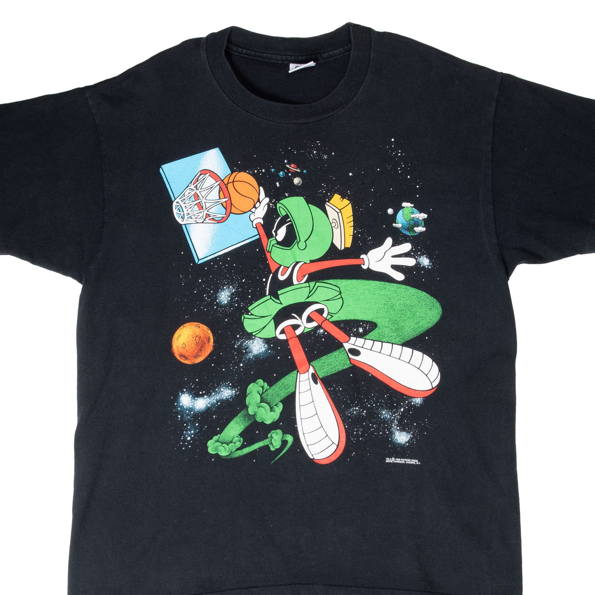 Front of black Looney Tunes T-shirt with Marvin the Martian dunking in outer space