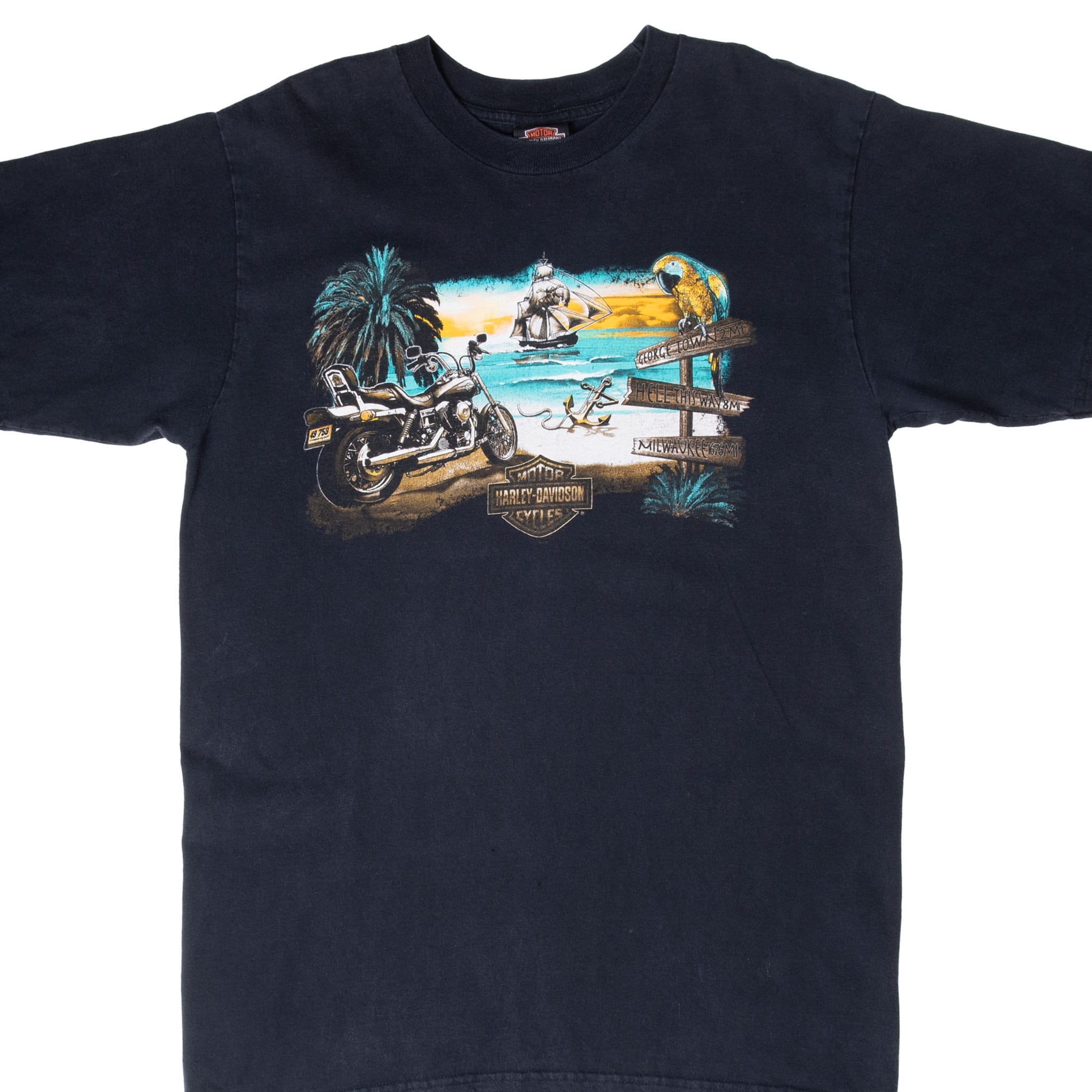 Front of black Harley-Davidson T-shirt with motorcycle, ship, parrot and tropical beach graphic