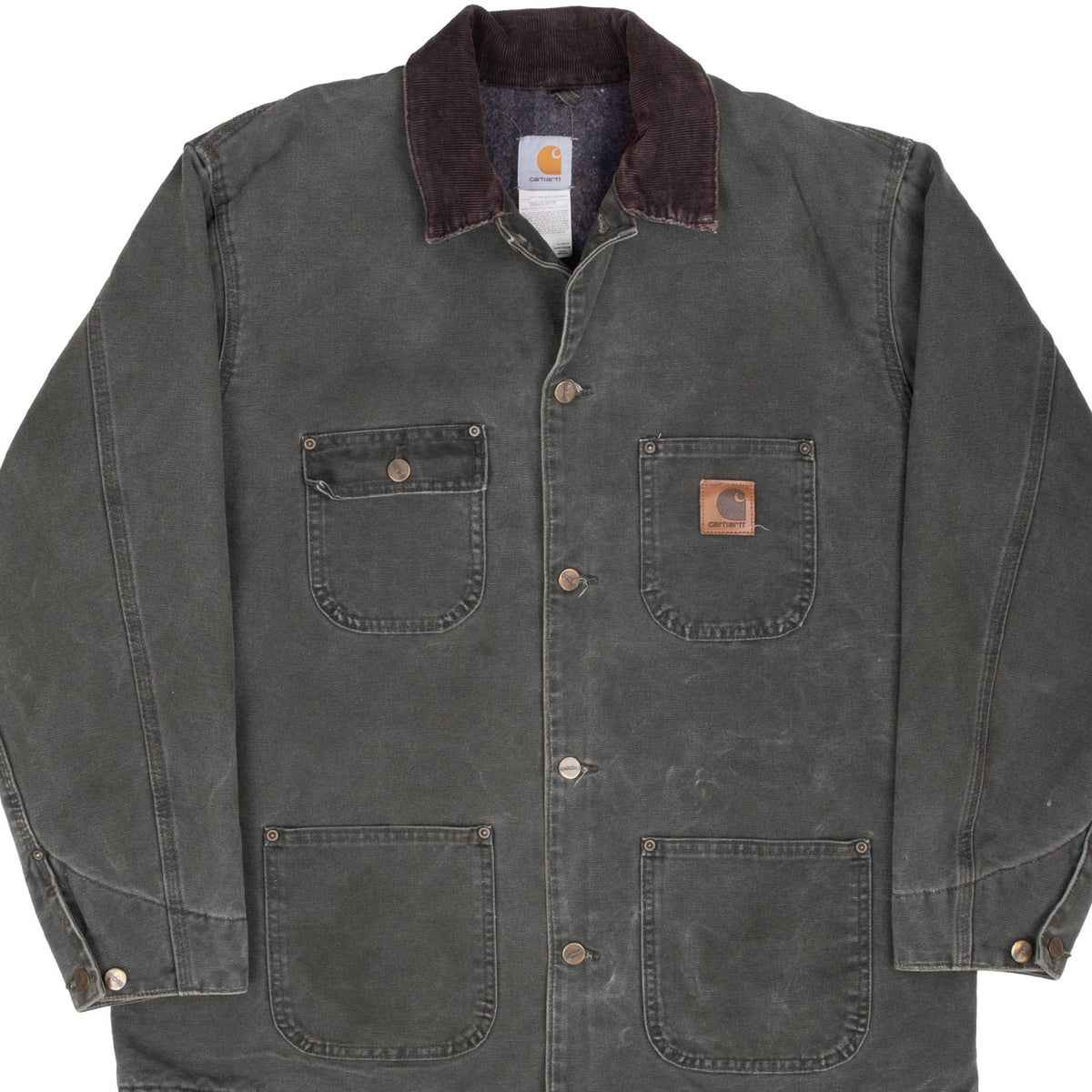 Front detail of green Carhartt Michigan chore jacket with corduroy collar and four patch pockets