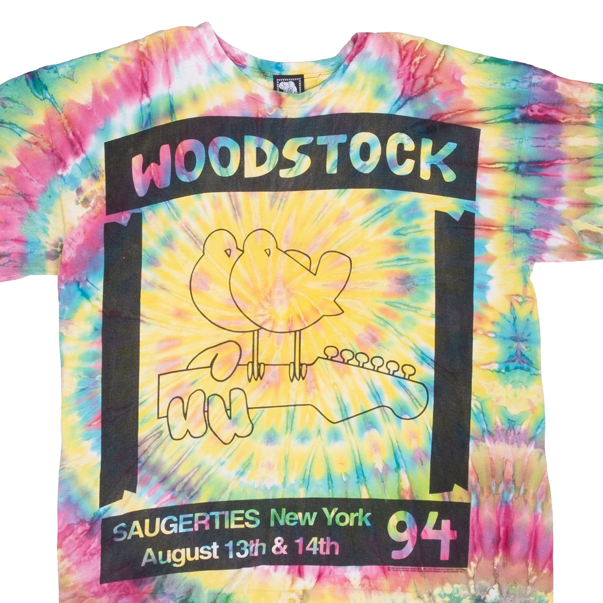 Front upper view of Woodstock 1994 tie-dye T-shirt with bird-and-guitar graphic