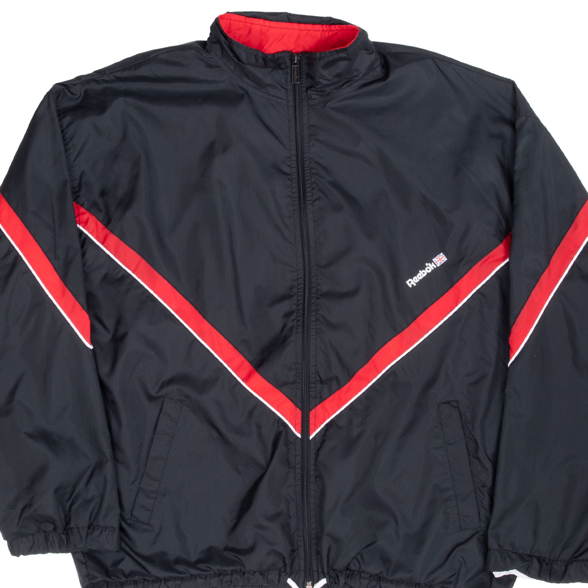 Front of black Reebok windbreaker with red chevron stripes, white piping and stand collar