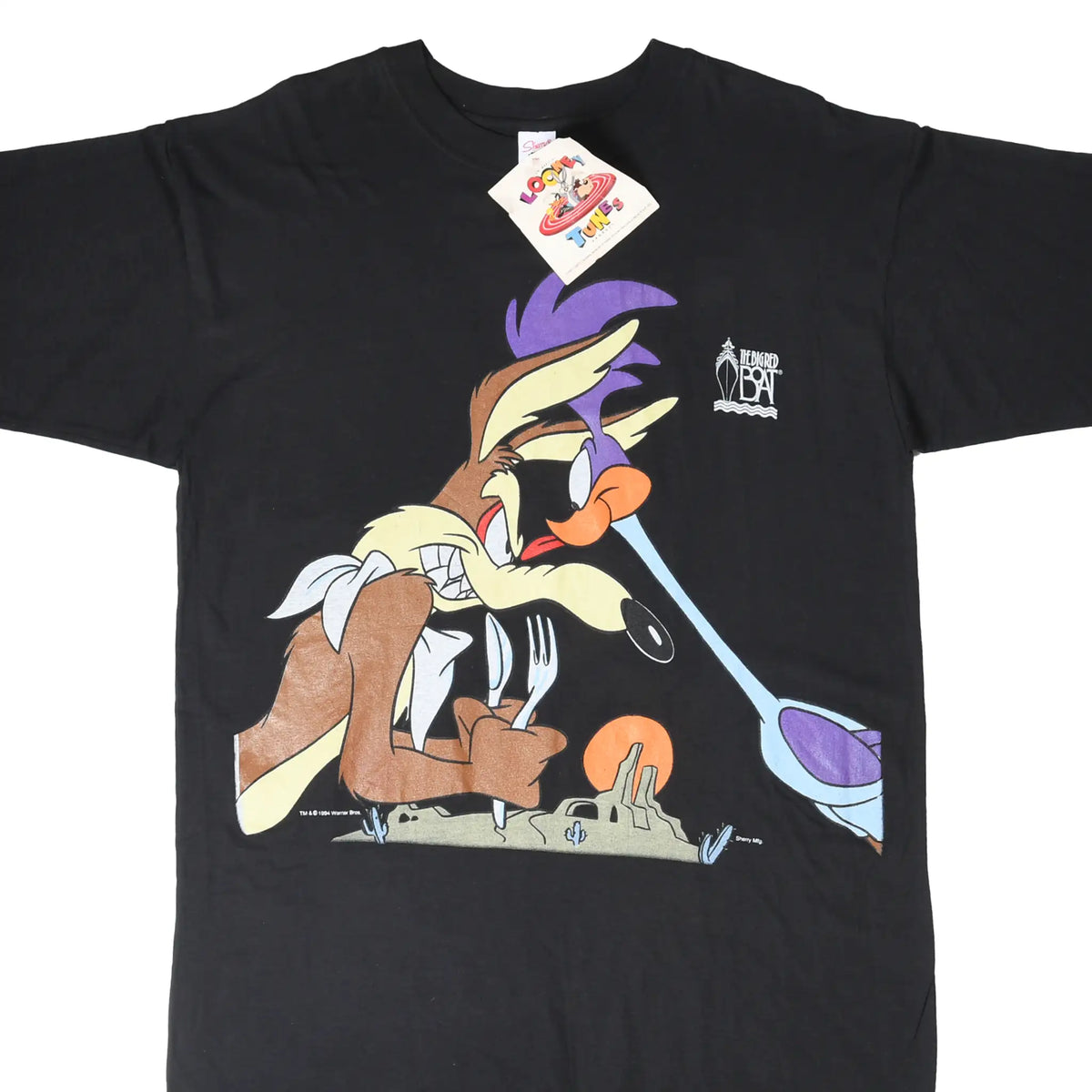 Front of black Looney Tunes T-shirt with Wile E. Coyote and Road Runner graphic and attached hangtag