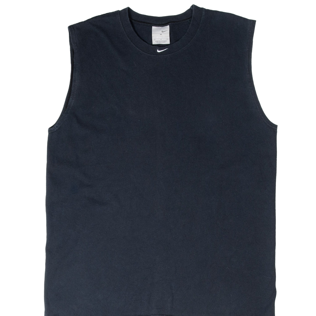 Upper front of black Nike tank top with small white Swoosh embroidery below the crew neck