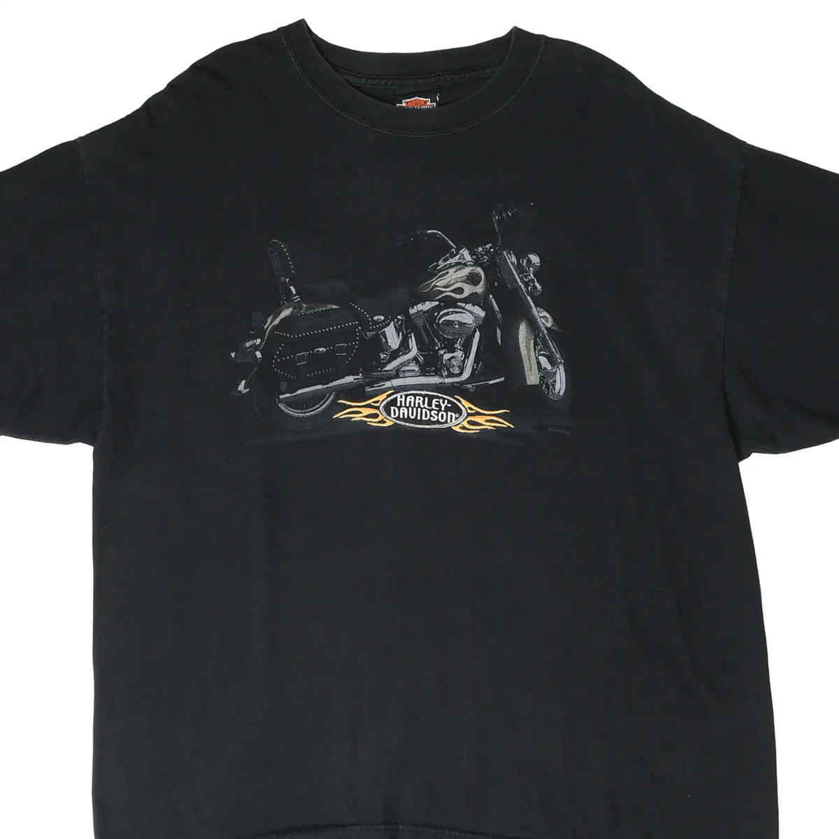 Front of black Harley-Davidson T-shirt with motorcycle and orange flame logo graphic