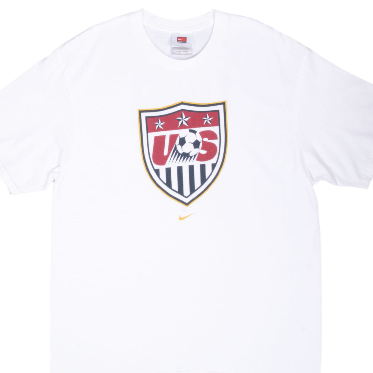 Front close-up of white Nike Team USA soccer T-shirt with crest graphic and gold Swoosh