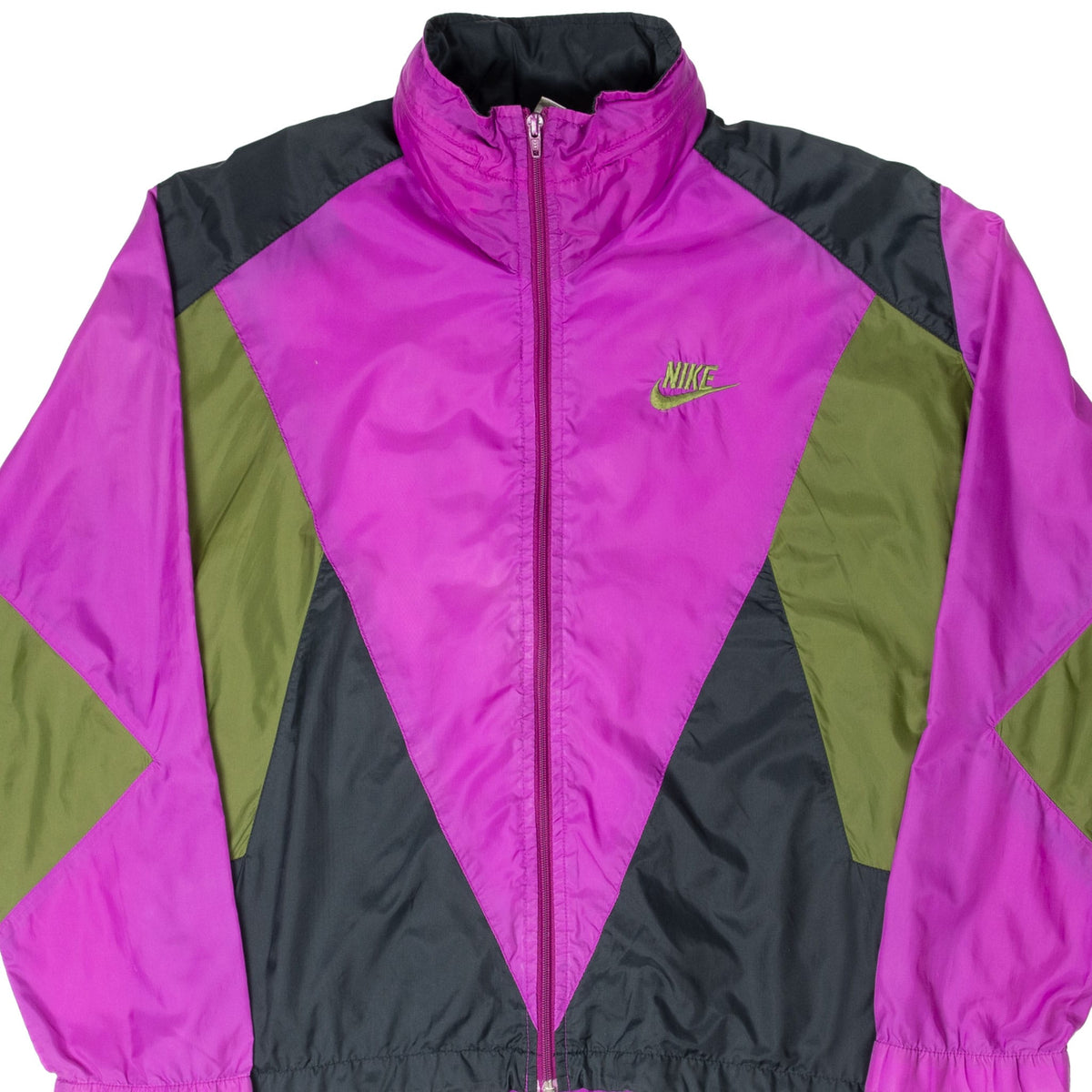 Front close-up of purple, green and black Nike windbreaker with embroidered Swoosh