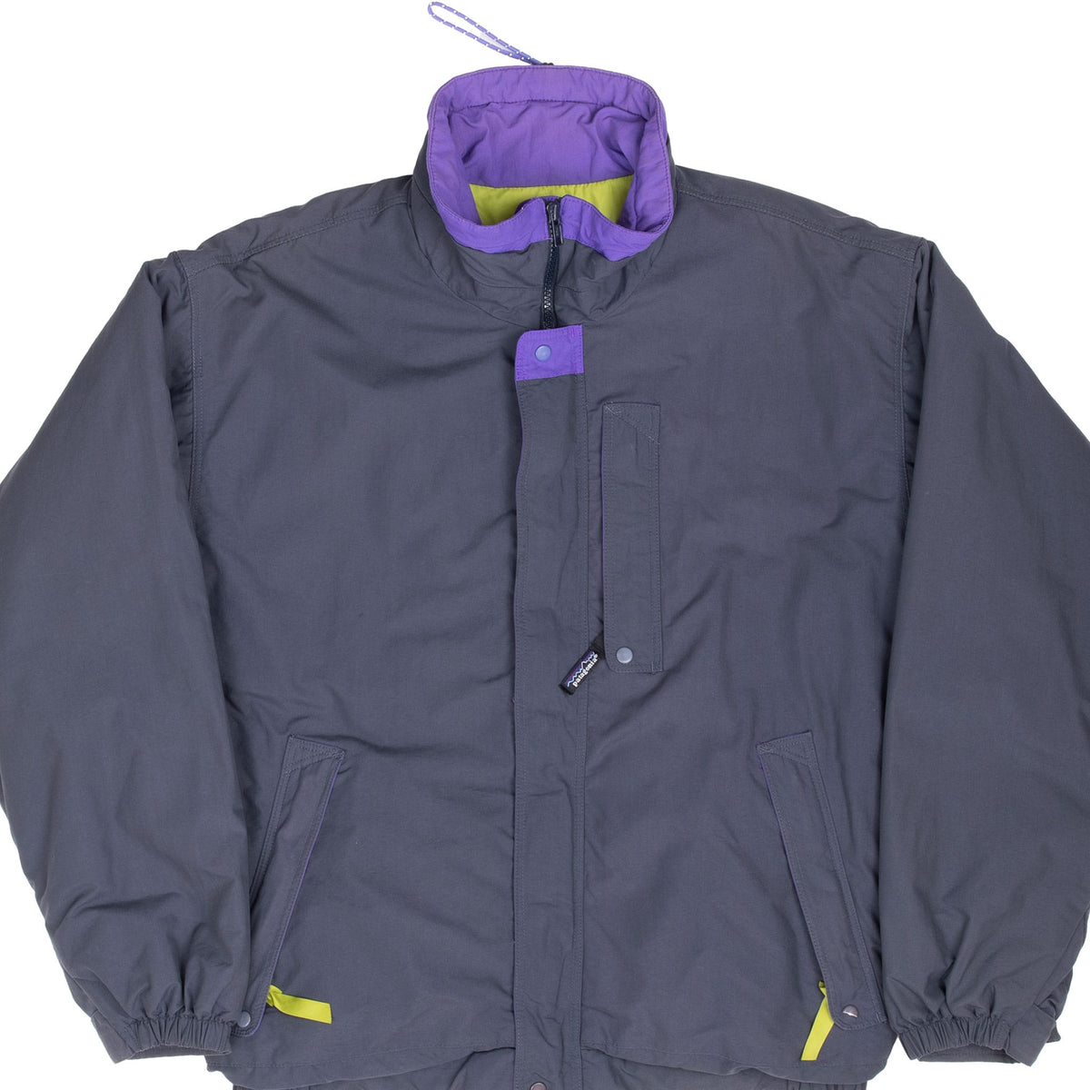 Front view of dark grey Patagonia Alpine jacket with purple collar and lime green accents