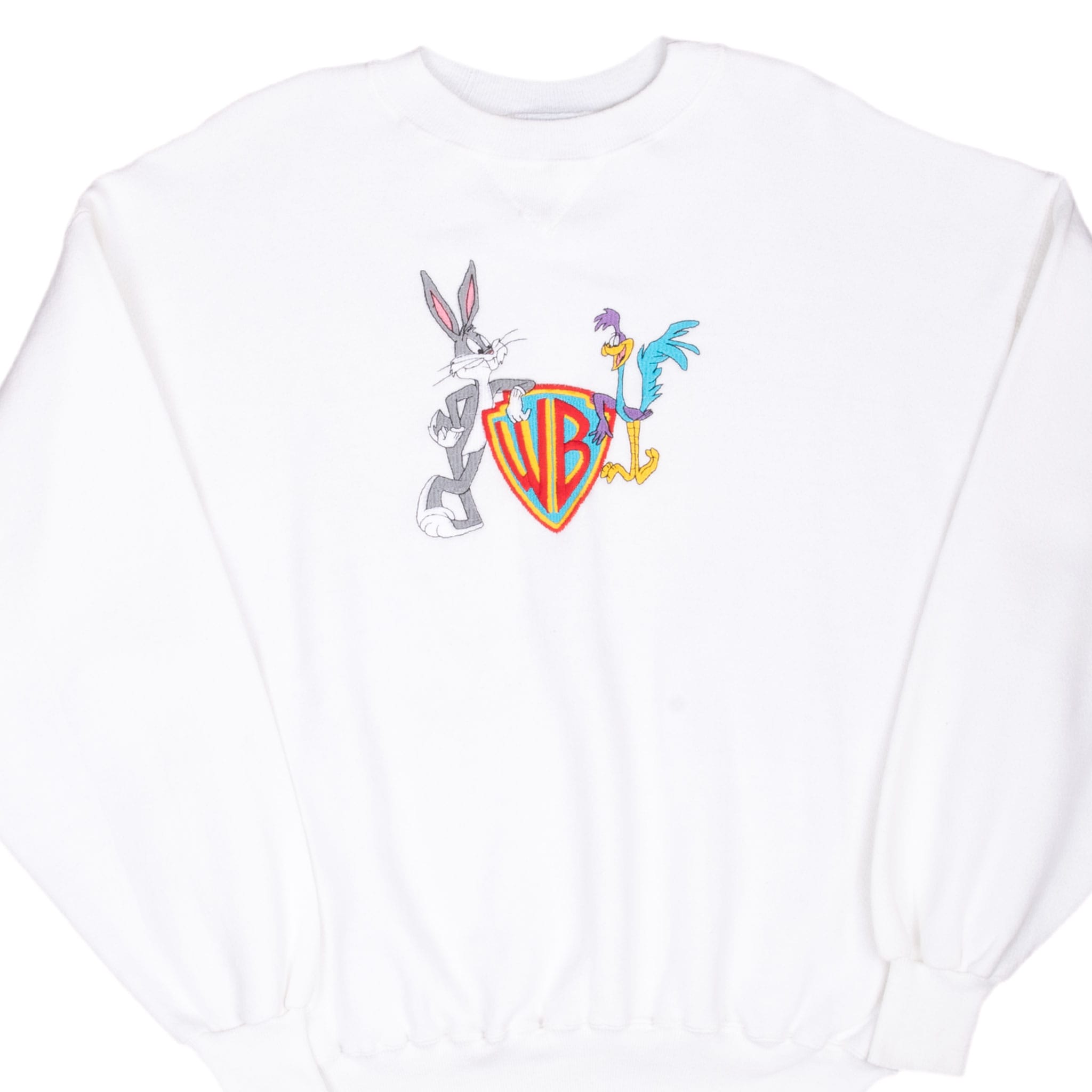 Front of white Warner Bros. sweatshirt with Bugs Bunny, Road Runner, and colorful WB shield graphic