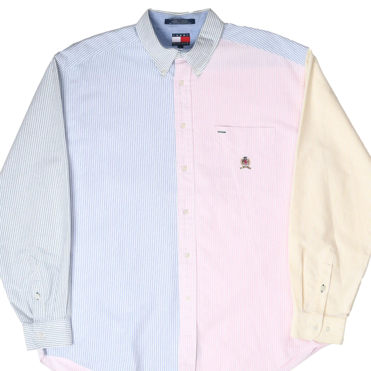 Front of Tommy Hilfiger button-down shirt with blue, pink, and yellow striped patchwork panels
