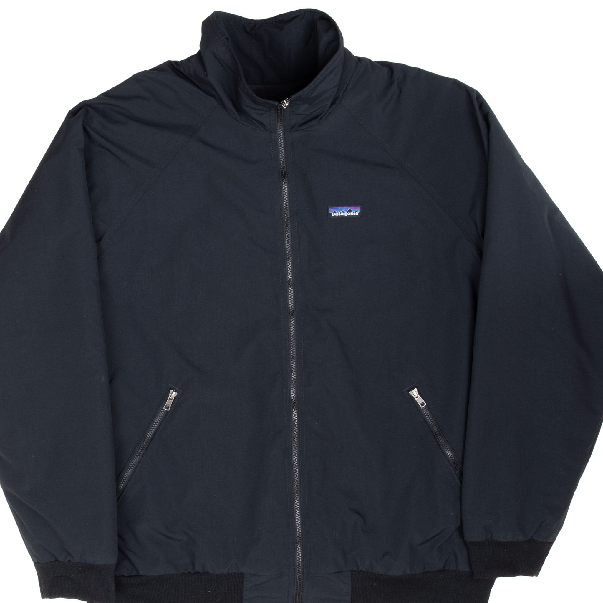 Front of black Patagonia Shelled Synchilla jacket with stand collar and zippered pockets