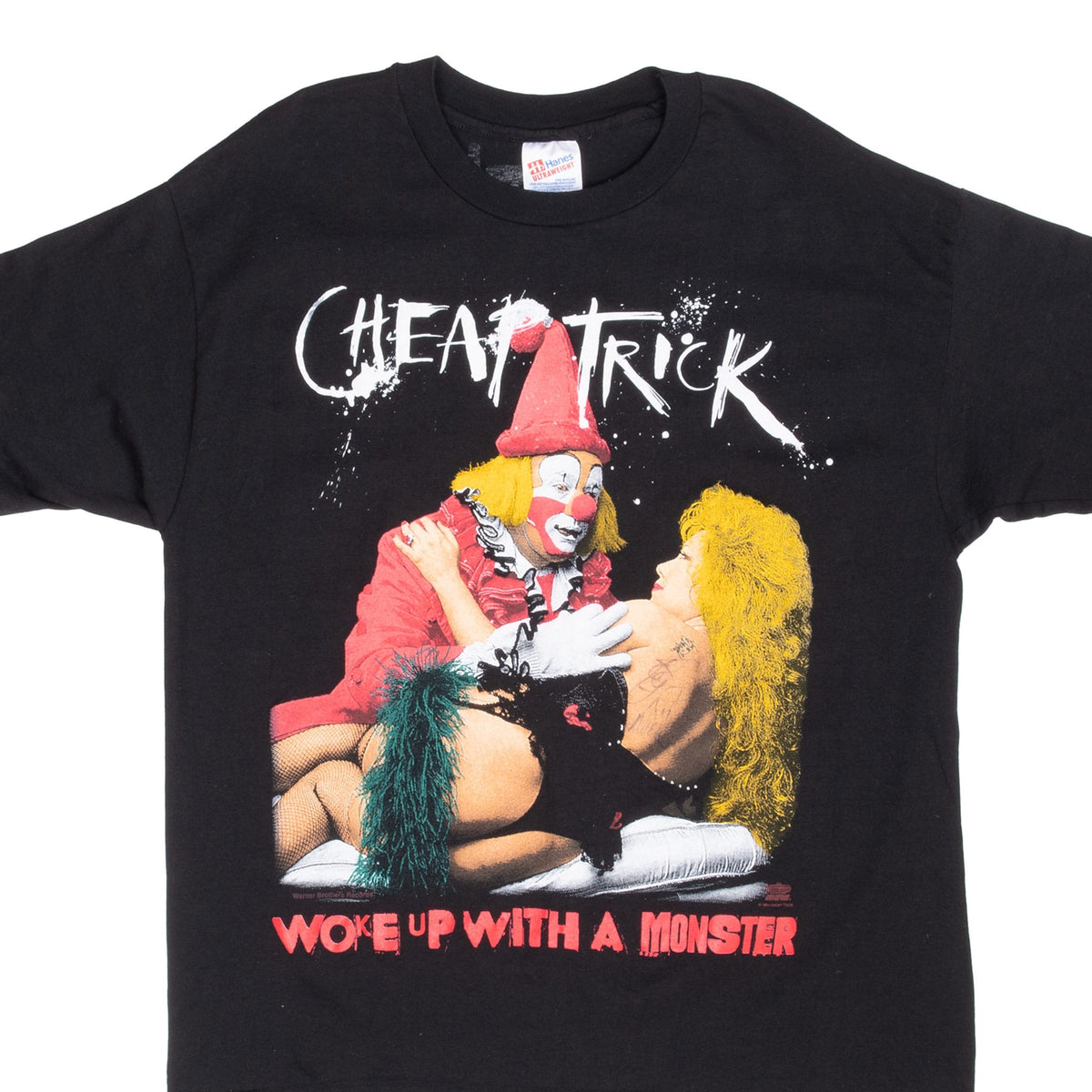Upper front of black Cheap Trick T-shirt with multicolor Woke Up with a Monster graphic