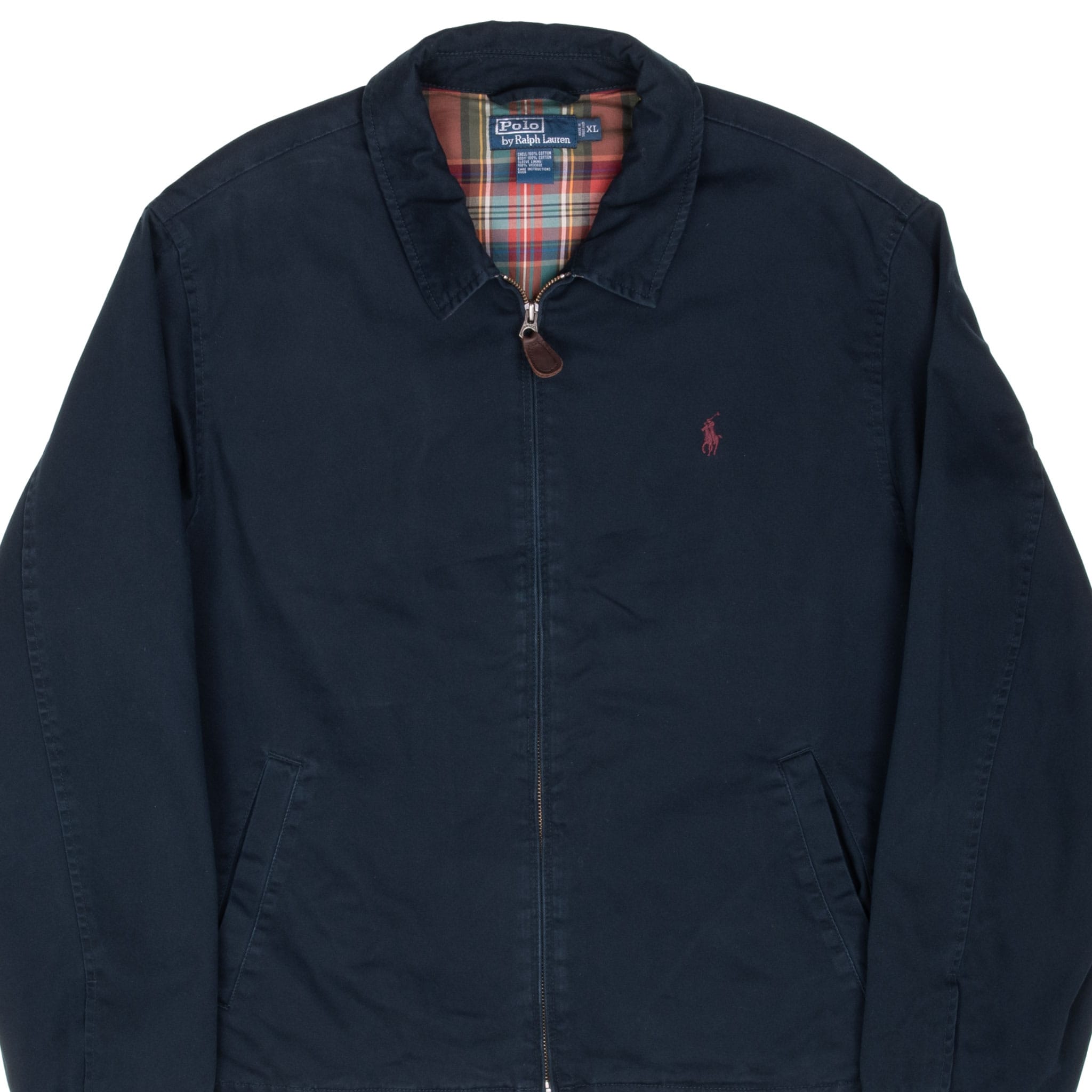 Front detail of navy Polo Ralph Lauren jacket with zip closure and angled pockets