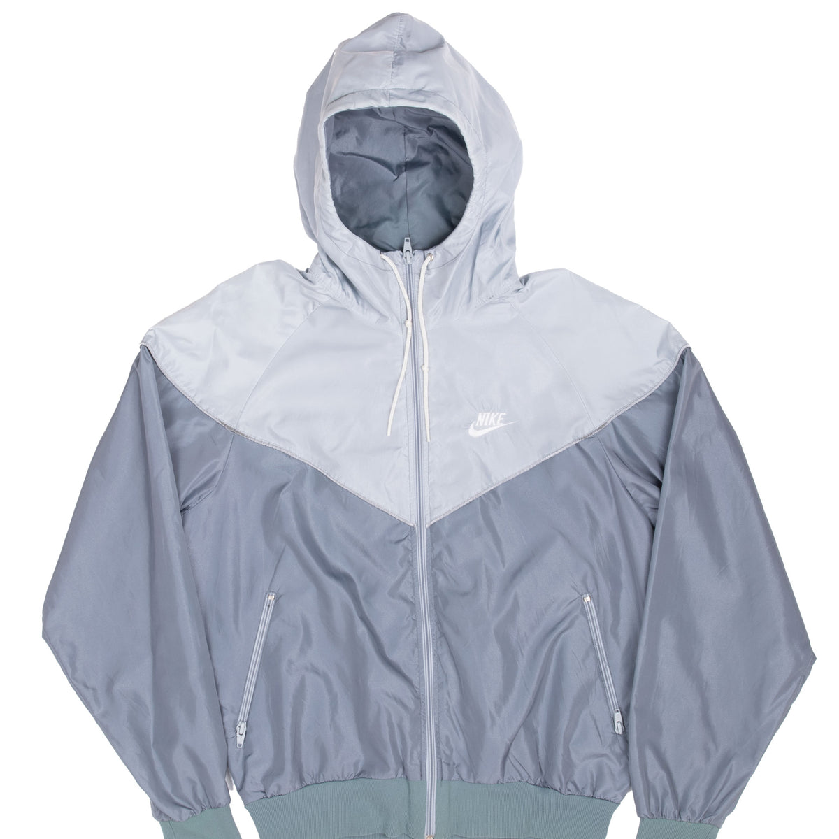 Front of grey color-block Nike full-zip hooded jacket with white Swoosh and zippered pockets