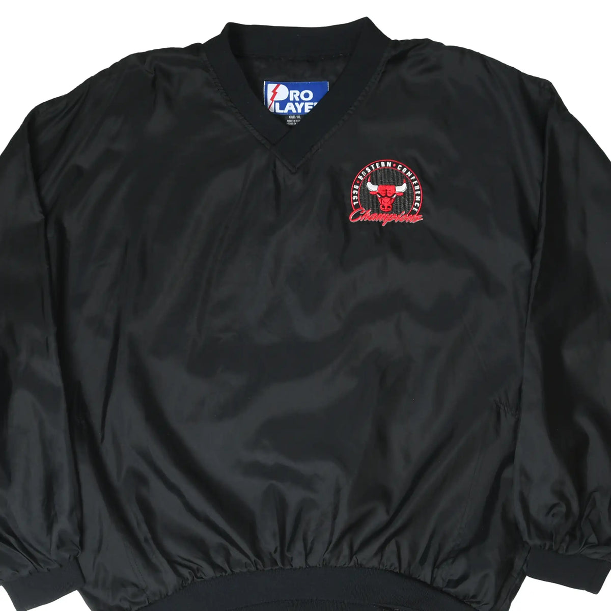 Front detail of black Chicago Bulls pullover windbreaker with embroidered chest logo