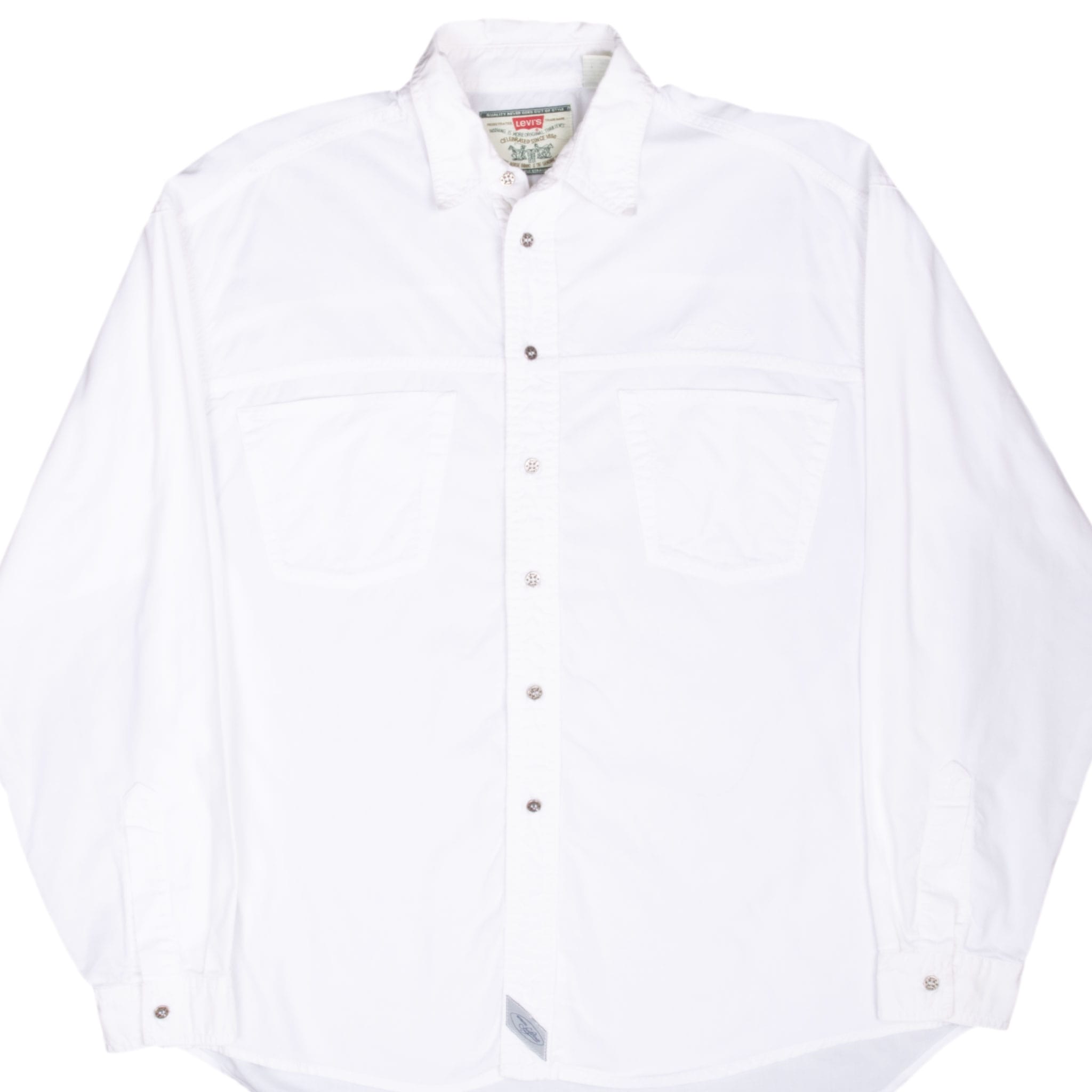 Front of white Levi's long-sleeve shirt with two chest pockets and metal buttons