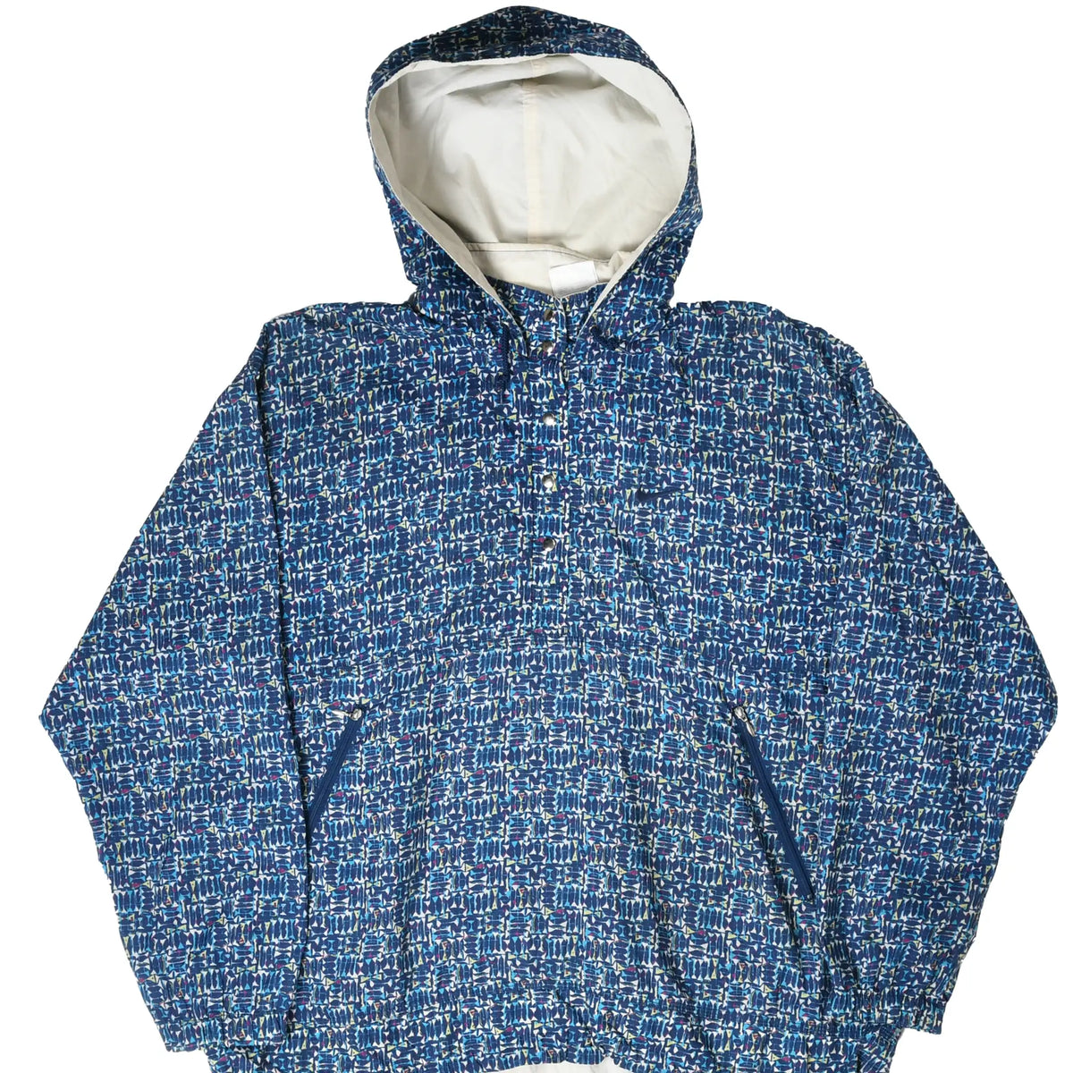 Front of Nike blue patterned hooded pullover jacket with white hood lining and zippered pockets