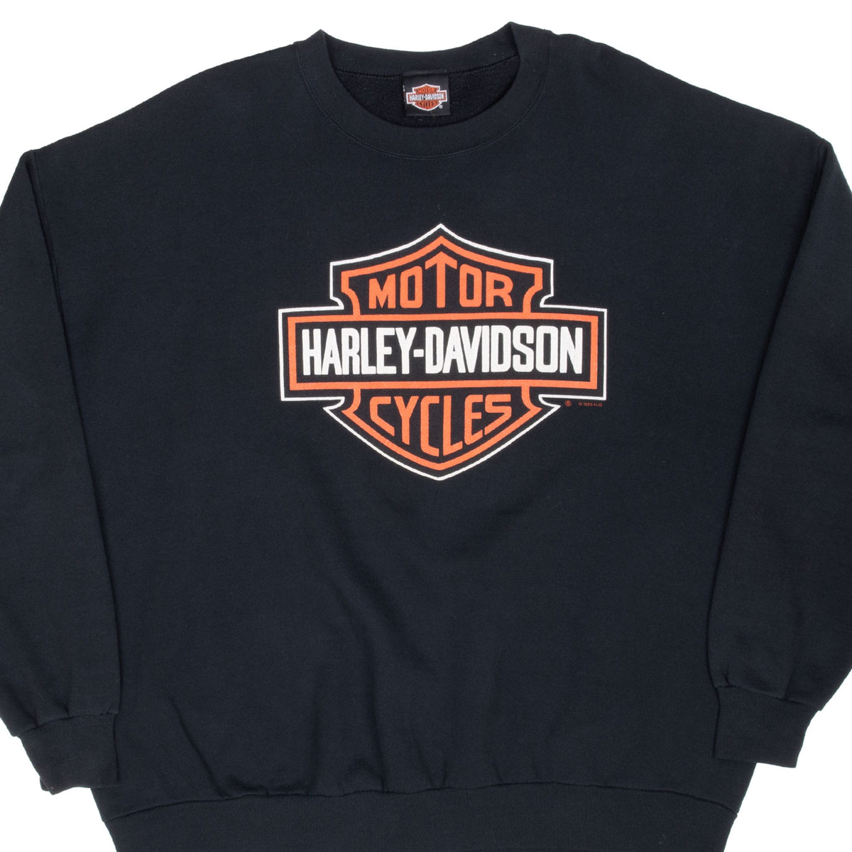 Front of black Harley-Davidson crewneck sweatshirt with orange and white shield logo