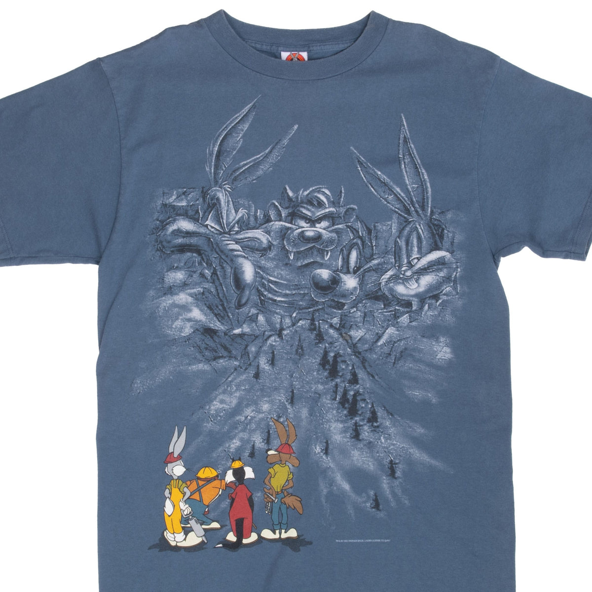 Front of blue Looney Tunes T-shirt with Taz, Bugs Bunny and Wile E. Coyote Mount Rushmore graphic