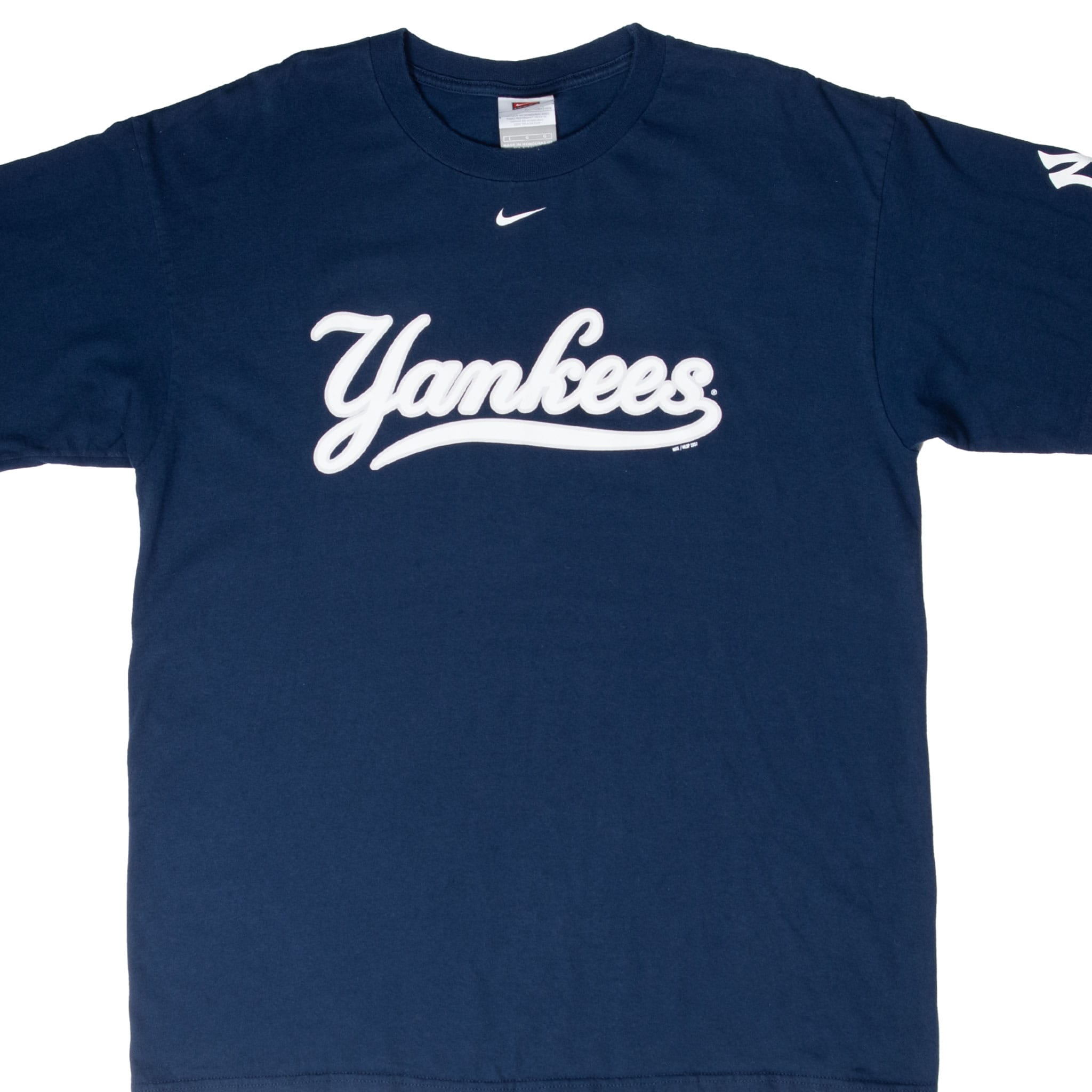 Front of navy Nike New York Yankees T-shirt with white script and centered Swoosh