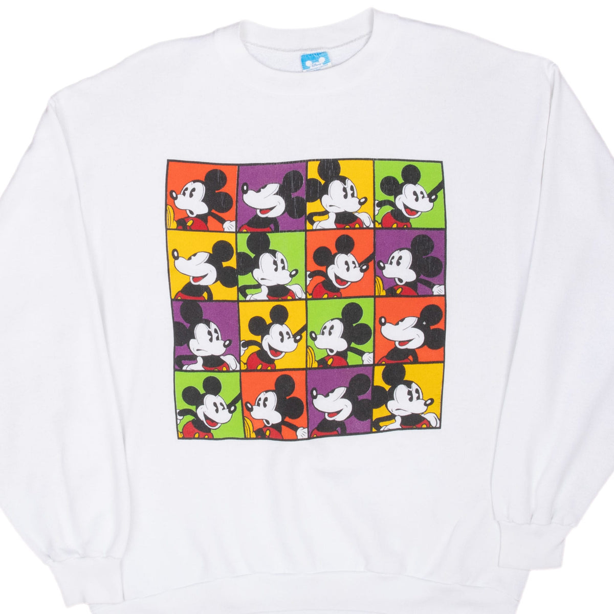 Front of white Disney sweatshirt with colorful 16-panel Mickey Mouse portrait graphic