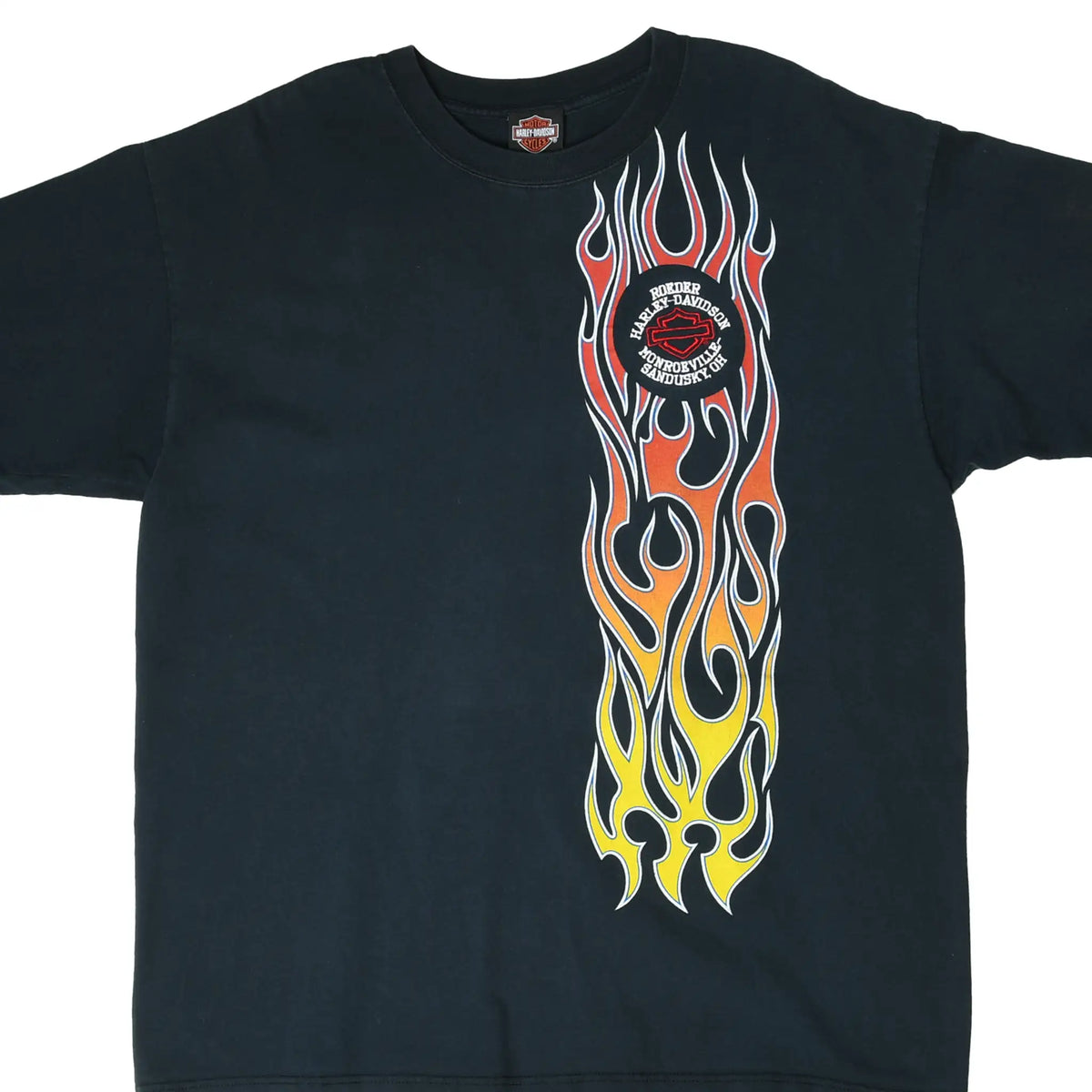 Front of black Harley-Davidson T-shirt with vertical red, orange and yellow flames and dealer logo