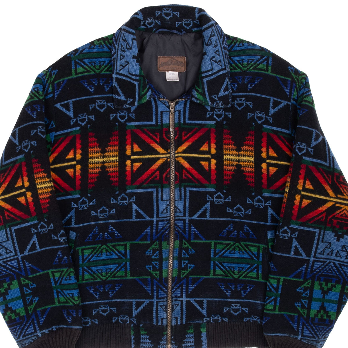 Front of Pendleton jacket with multicolor geometric pattern, pointed collar and full zipper