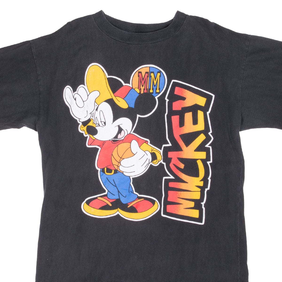 Front of black Disney T-shirt with Mickey Mouse holding a basketball and vertical Mickey lettering