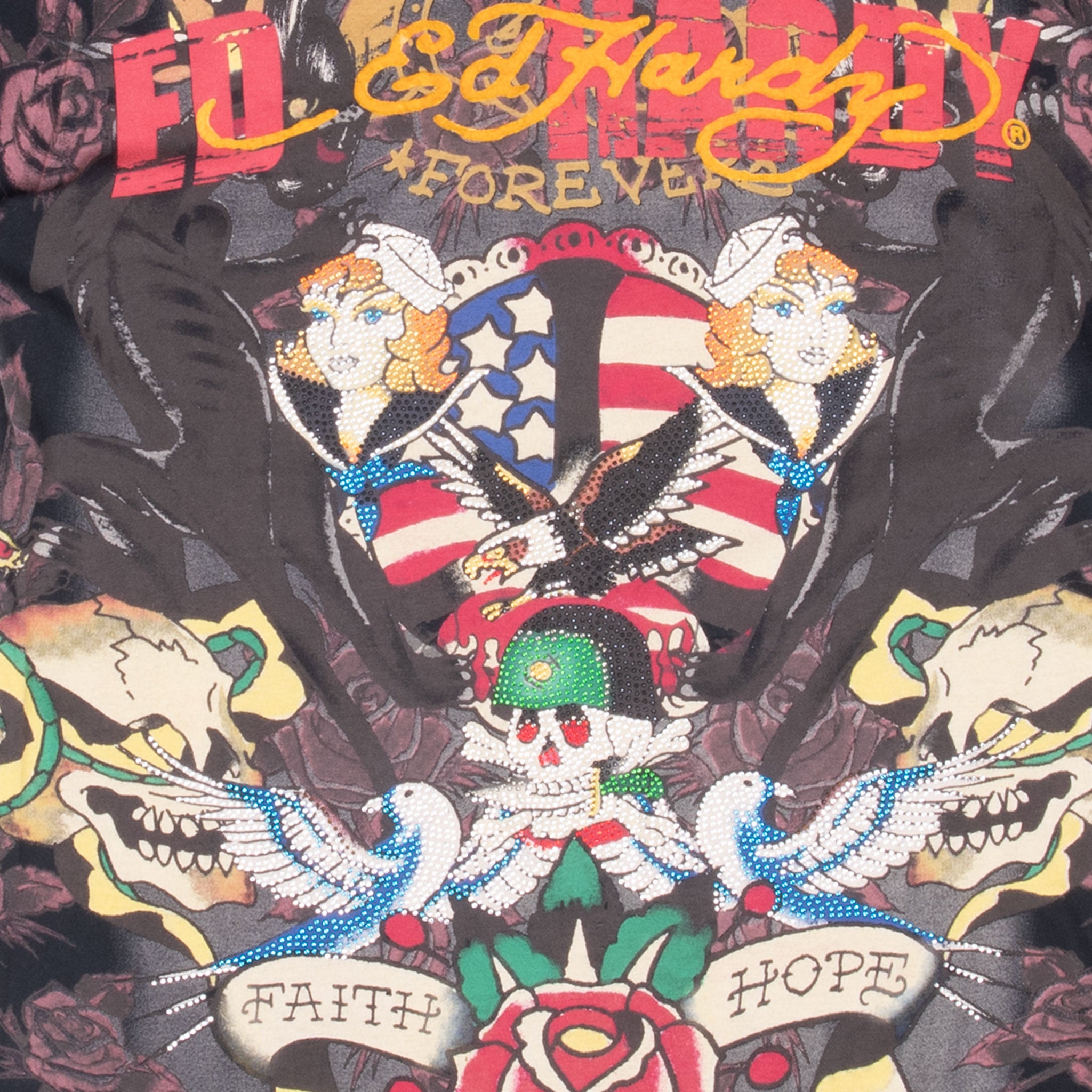 Front graphic detail with rhinestone eagle, skull, swallows, flags, and Faith Hope banners