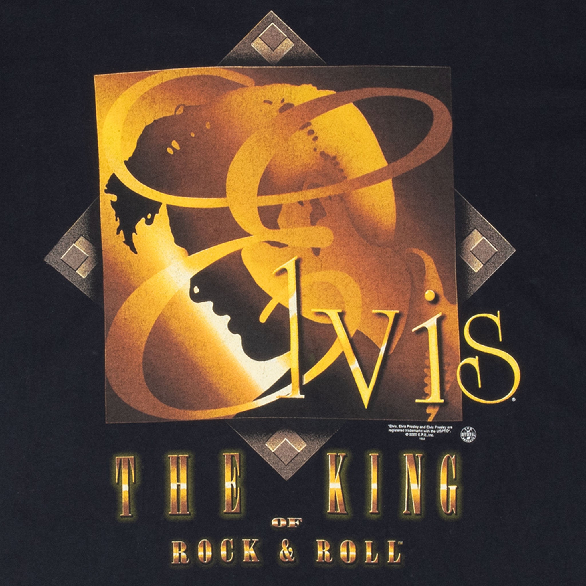 Close-up of gold and brown Elvis silhouette and The King of Rock & Roll front print