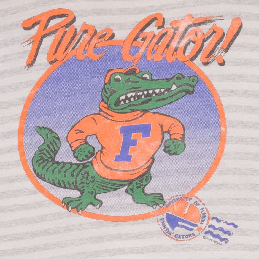 Close-up of Pure Gator text and Florida Gators mascot print in orange, green, and blue